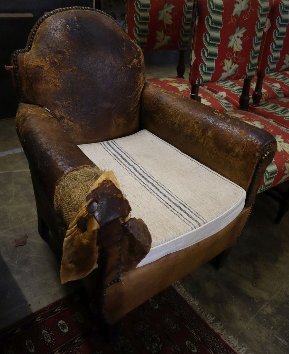 A French tan leather club armchair (a.f), width 76cm, depth 70cm, height 87cm